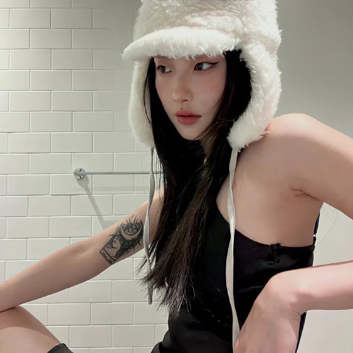 绿杨移作两家春